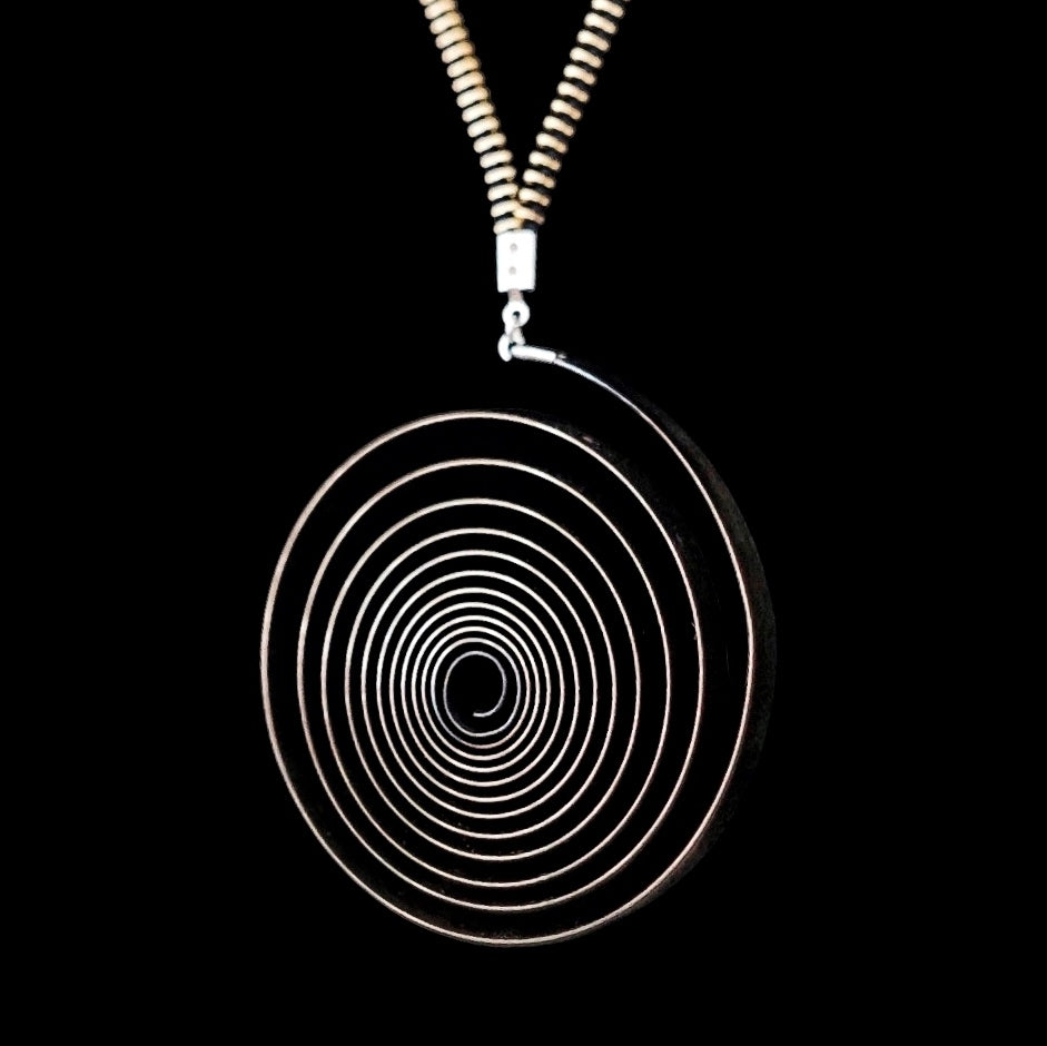 Spiral – Steel Pendant Necklace – Recovered Clock Mainspring – Bitácora Collection