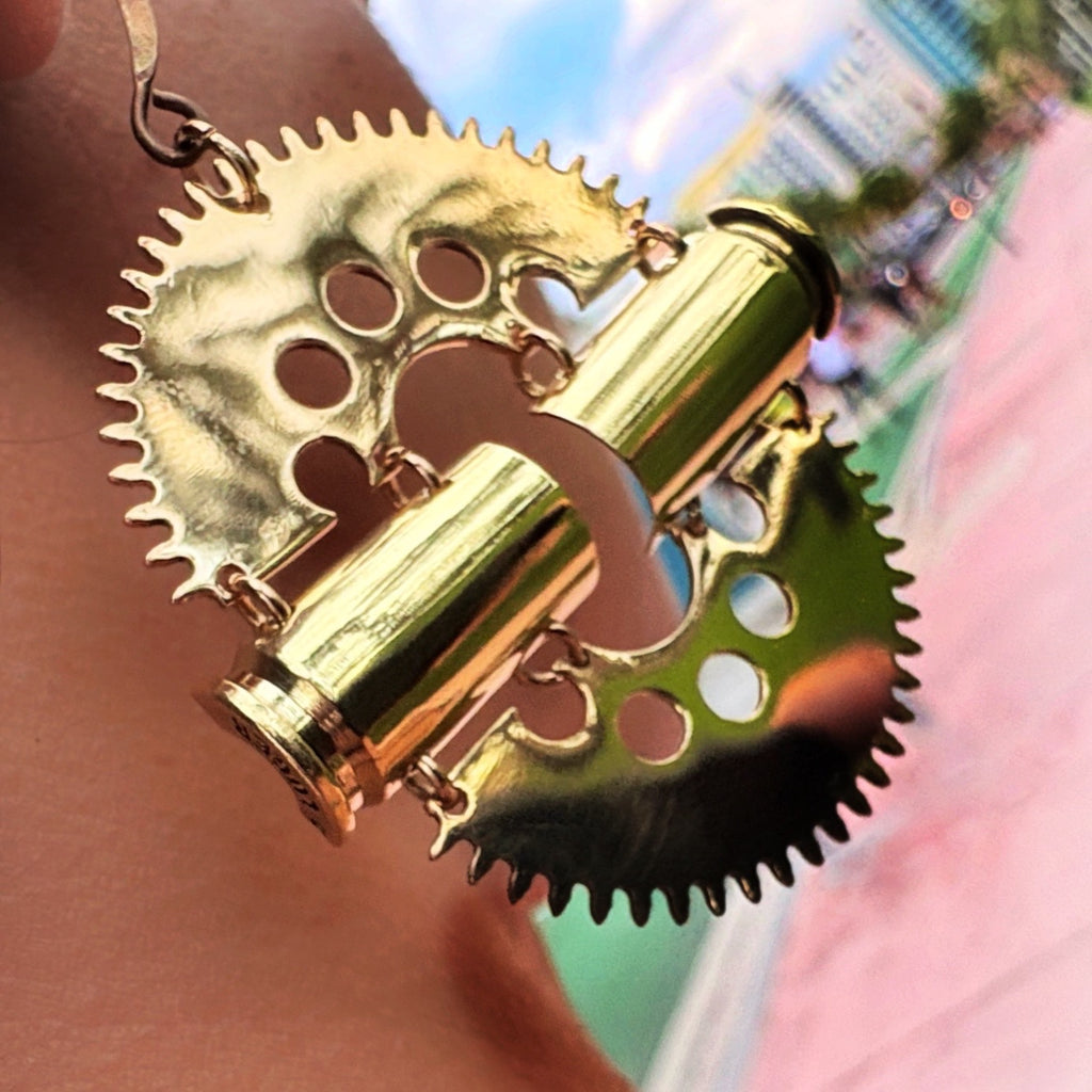 Impact – Statement Bronze Earrings with Bullet Casings and Gears | Symbolic Jewelry
